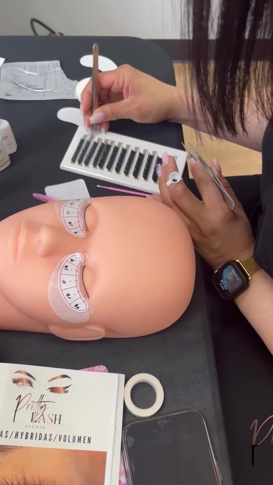 Student practicing on a mannequin