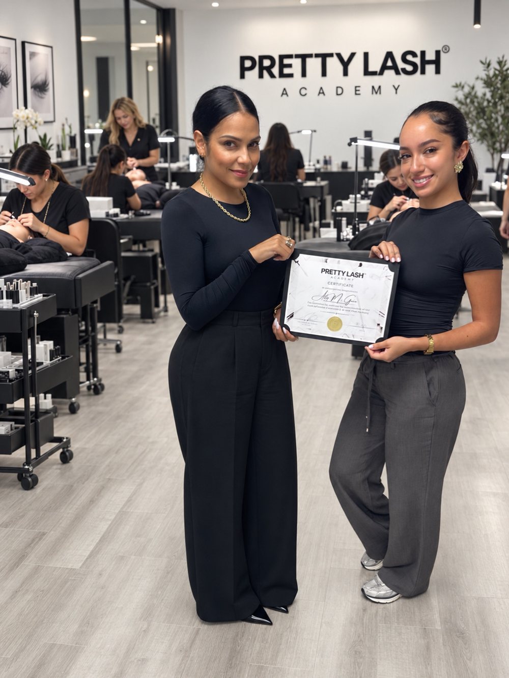 Iraida with a certified Pretty Lash Academy graduate